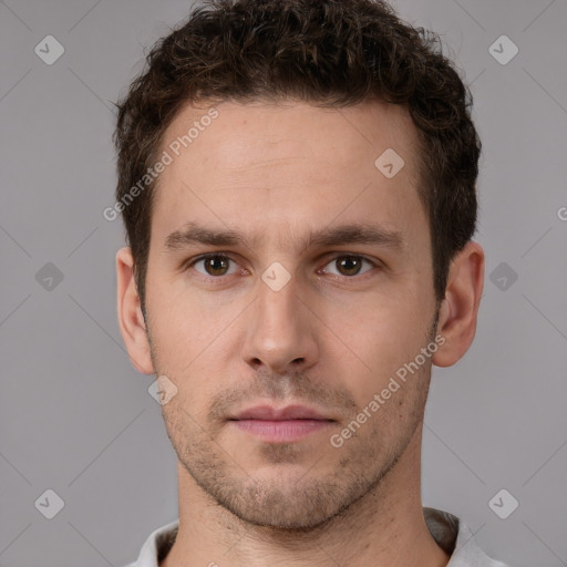 Neutral white young-adult male with short  brown hair and brown eyes