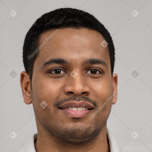 Joyful latino young-adult male with short  brown hair and brown eyes