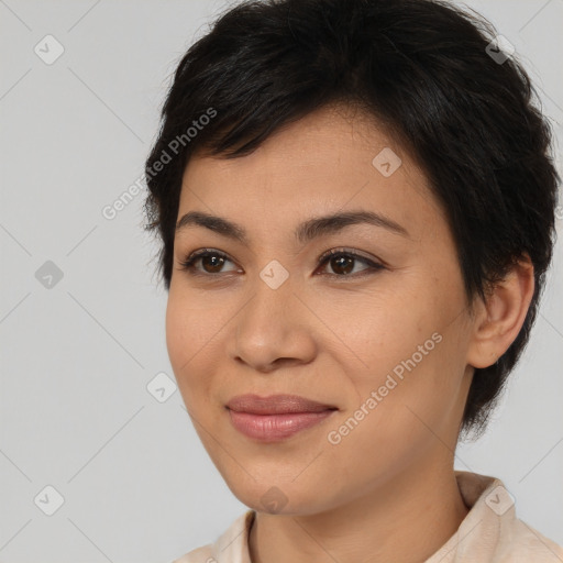 Joyful asian young-adult female with medium  brown hair and brown eyes