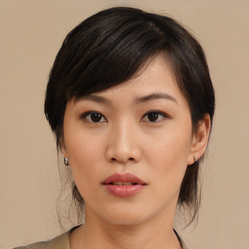 Neutral asian young-adult female with medium  black hair and brown eyes