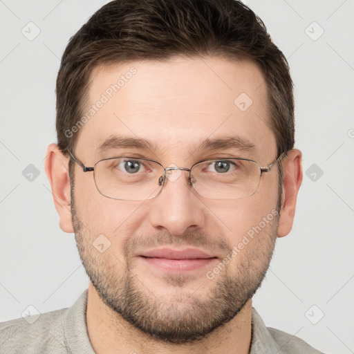 Joyful white adult male with short  brown hair and grey eyes