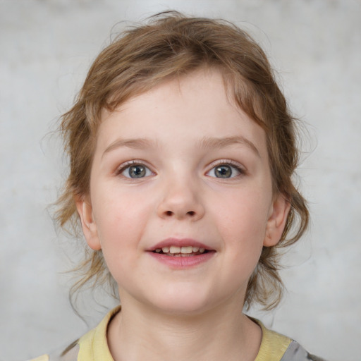 Joyful white child female with medium  brown hair and blue eyes