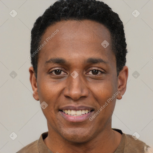 Joyful black young-adult male with short  black hair and brown eyes