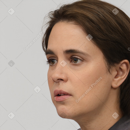 Neutral white young-adult female with medium  brown hair and brown eyes