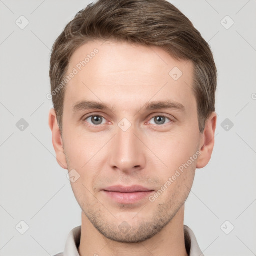 Neutral white young-adult male with short  brown hair and grey eyes