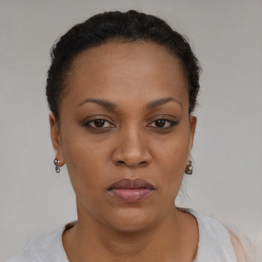 Neutral black young-adult female with short  brown hair and brown eyes