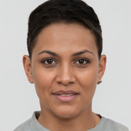 Joyful white young-adult female with short  brown hair and brown eyes