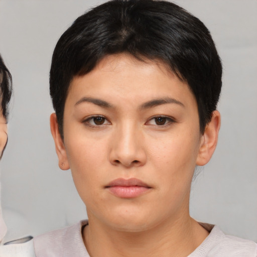 Neutral asian young-adult female with short  brown hair and brown eyes