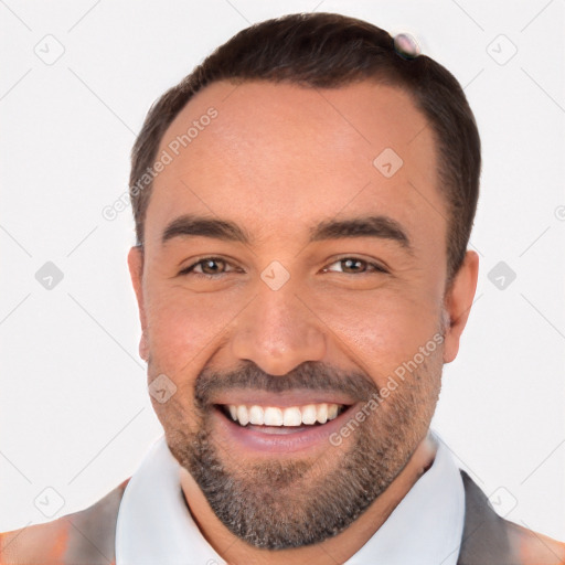 Joyful white young-adult male with short  black hair and brown eyes