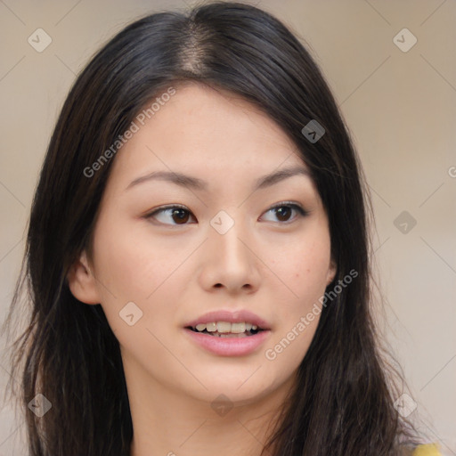 Joyful asian young-adult female with long  brown hair and brown eyes