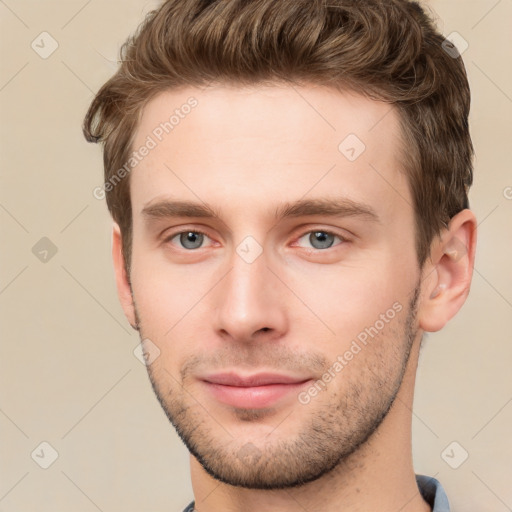 Neutral white young-adult male with short  brown hair and grey eyes