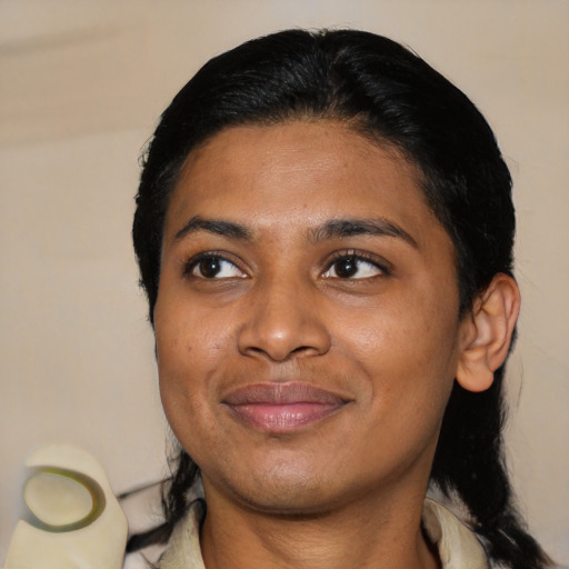 Joyful asian young-adult female with medium  black hair and brown eyes