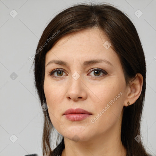 Neutral white young-adult female with medium  brown hair and brown eyes