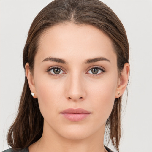 Neutral white young-adult female with medium  brown hair and grey eyes