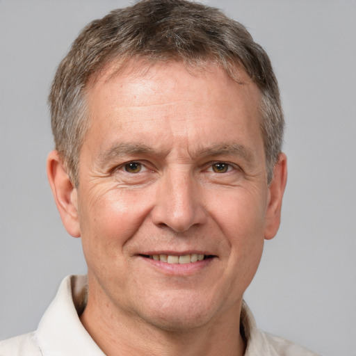 Joyful white middle-aged male with short  brown hair and brown eyes