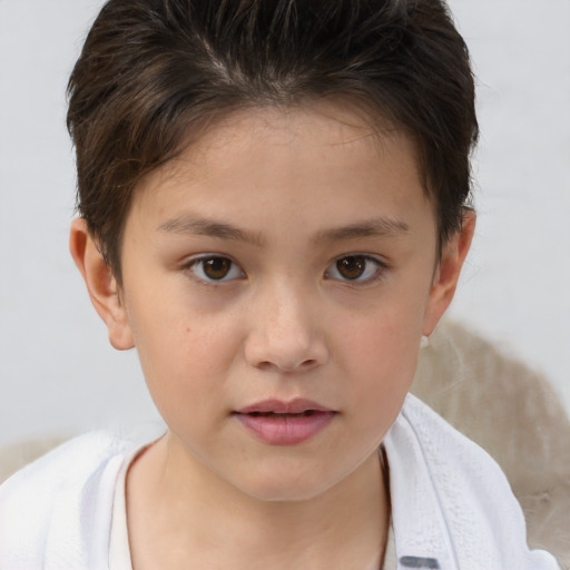 Joyful white child female with short  brown hair and brown eyes