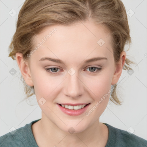 Joyful white young-adult female with medium  brown hair and blue eyes