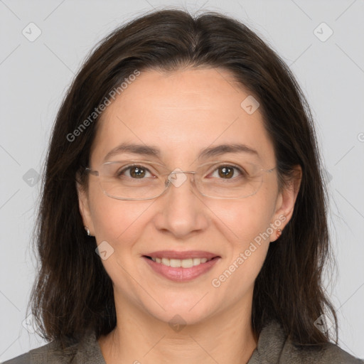 Joyful white adult female with medium  brown hair and brown eyes