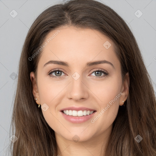 Joyful white young-adult female with long  brown hair and grey eyes