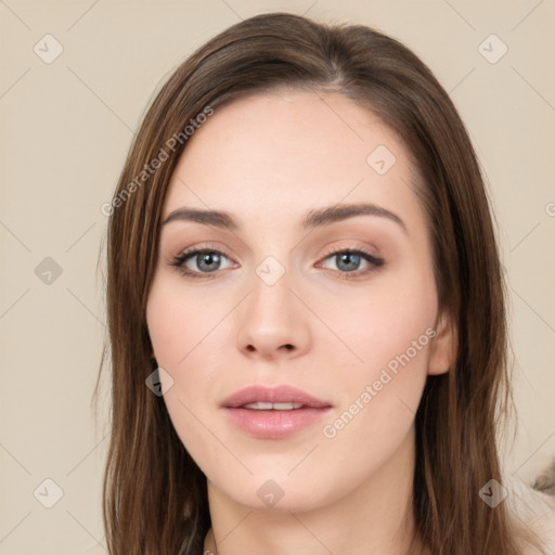 Neutral white young-adult female with long  brown hair and brown eyes