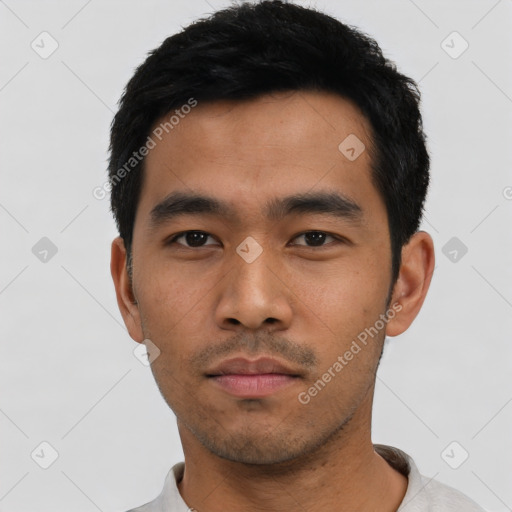 Neutral asian young-adult male with short  black hair and brown eyes