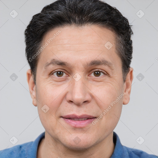 Joyful white adult male with short  brown hair and brown eyes