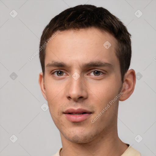 Neutral white young-adult male with short  brown hair and brown eyes