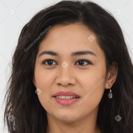 Joyful asian young-adult female with long  brown hair and brown eyes