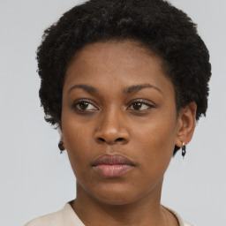 Neutral black young-adult female with short  brown hair and brown eyes