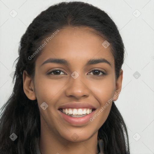 Joyful latino young-adult female with long  brown hair and brown eyes