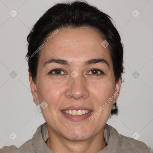 Joyful white adult female with short  brown hair and brown eyes