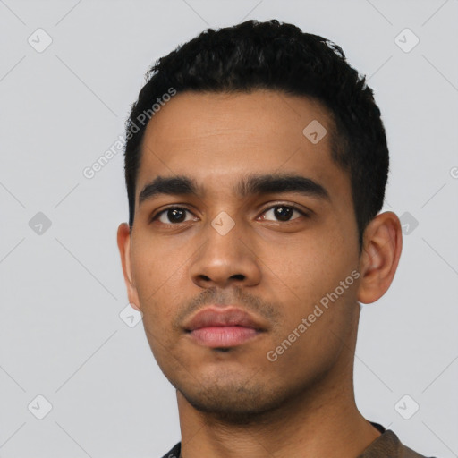 Neutral latino young-adult male with short  black hair and brown eyes