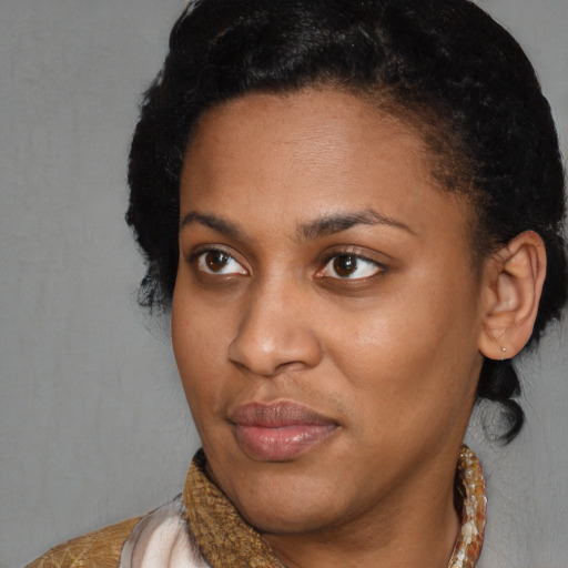 Neutral black young-adult female with short  brown hair and brown eyes