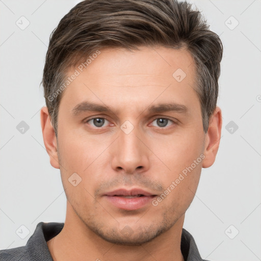 Neutral white young-adult male with short  brown hair and brown eyes