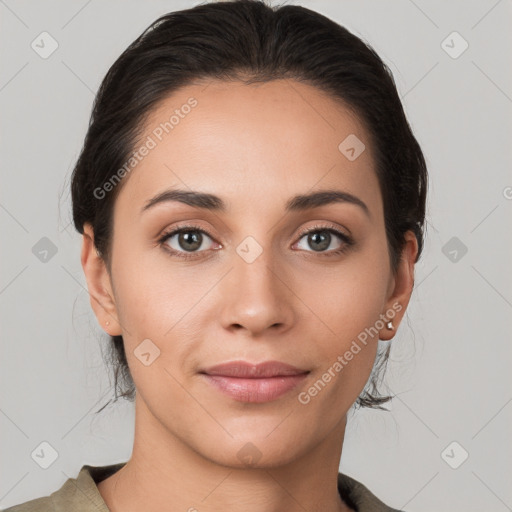 Joyful white young-adult female with medium  brown hair and brown eyes