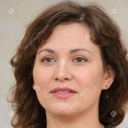 Joyful white young-adult female with medium  brown hair and green eyes