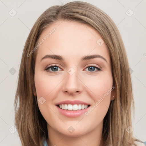 Joyful white young-adult female with long  brown hair and grey eyes