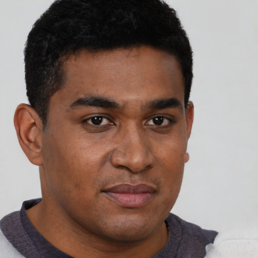 Neutral black young-adult male with short  brown hair and brown eyes