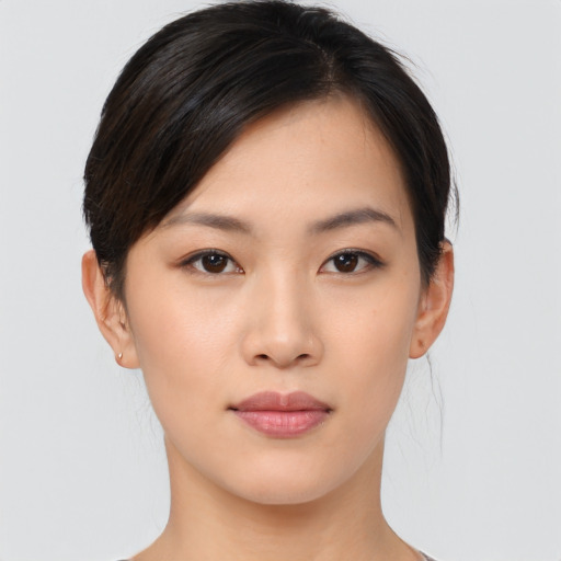 Neutral asian young-adult female with short  brown hair and brown eyes