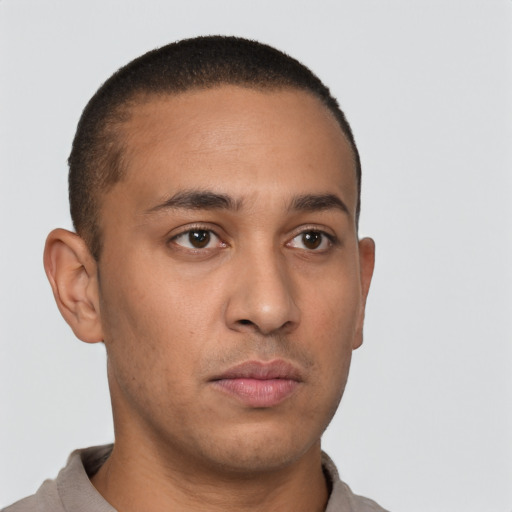 Neutral latino young-adult male with short  brown hair and brown eyes