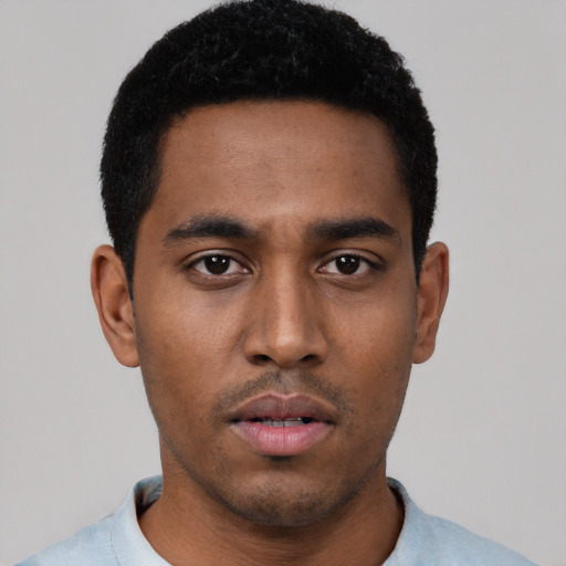 Neutral black young-adult male with short  black hair and brown eyes
