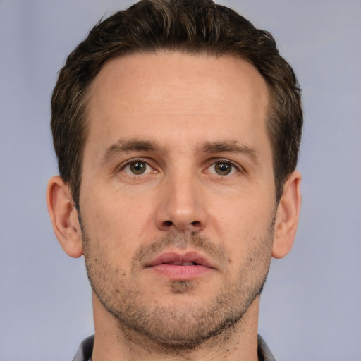 Neutral white adult male with short  brown hair and brown eyes