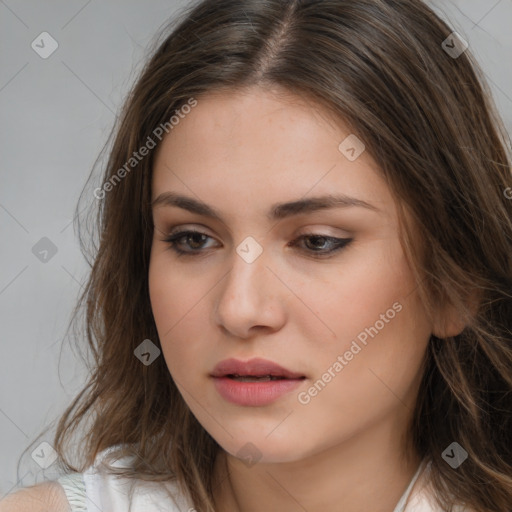 Neutral white young-adult female with long  brown hair and brown eyes