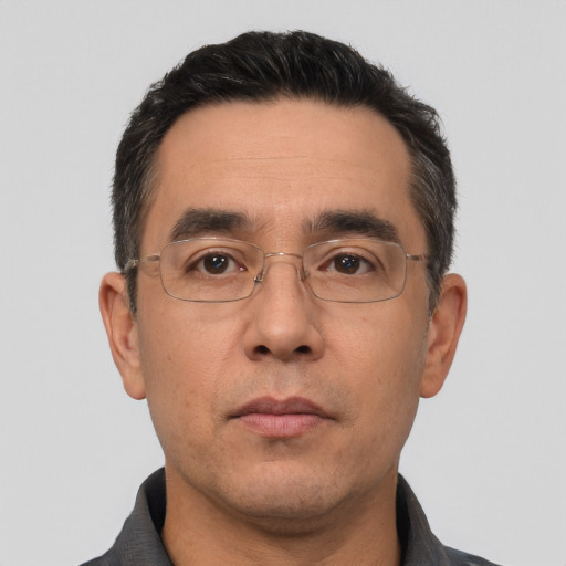 Neutral white adult male with short  black hair and brown eyes