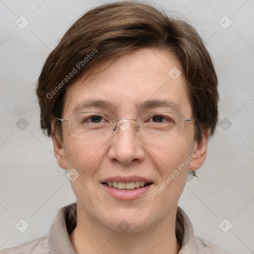 Joyful white adult female with short  brown hair and grey eyes