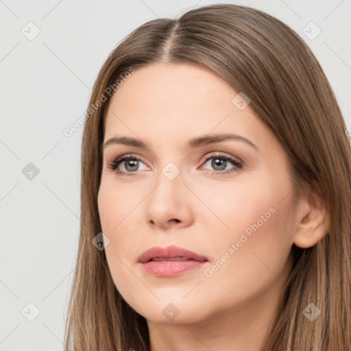 Neutral white young-adult female with long  brown hair and brown eyes