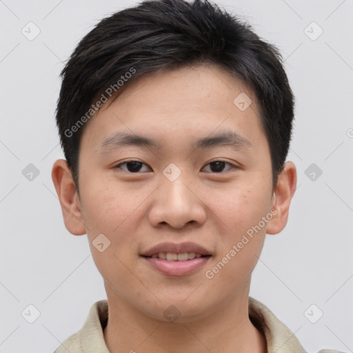 Joyful asian young-adult male with short  brown hair and brown eyes