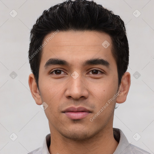 Neutral latino young-adult male with short  black hair and brown eyes