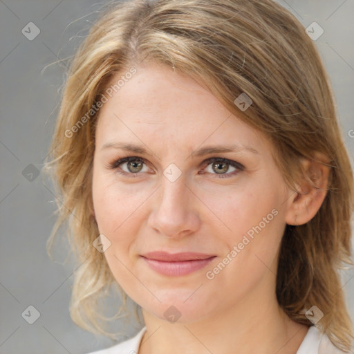 Joyful white young-adult female with medium  brown hair and blue eyes