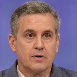 Neutral white middle-aged male with short  brown hair and brown eyes